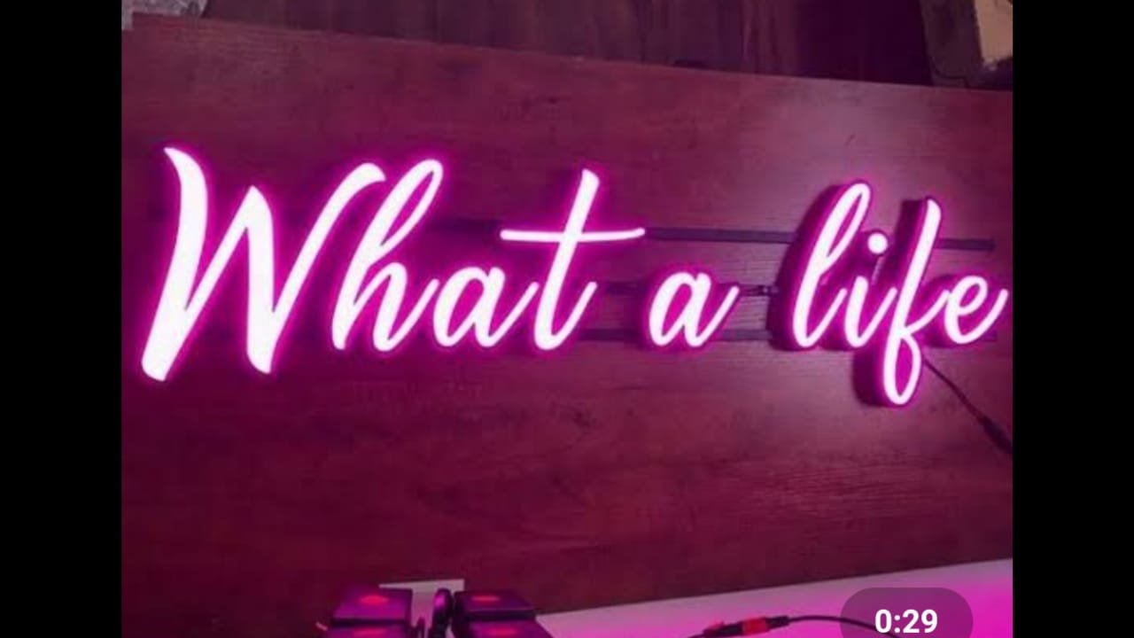 Pink neon script signage